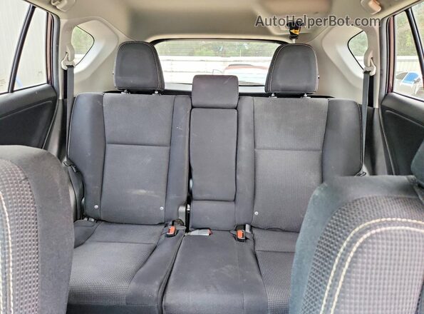 2T3WFREV9HW338876 2017 TOYOTA RAV4 Purple Rear seats view