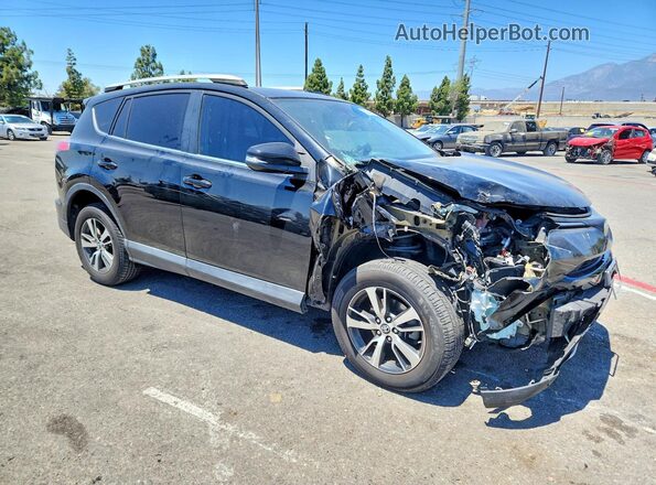 2T3WFREV9HW385275 2017 TOYOTA RAV4 Черный Передняя правая четверть