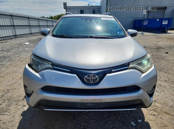 2T3WFREV9JW476701 2018 TOYOTA RAV4 Silver Front view