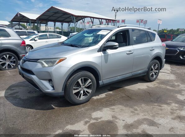 2T3WFREV9JW485852 2018 TOYOTA RAV4 Silver Front left
