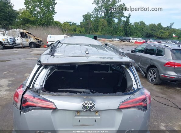 2T3WFREV9JW485852 2018 TOYOTA RAV4 Silver Front view