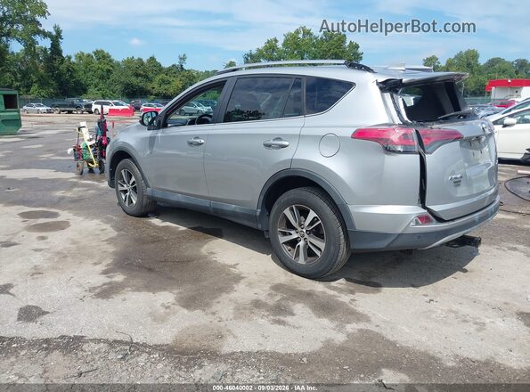 2T3WFREV9JW485852 2018 TOYOTA RAV4 Silver Rear left
