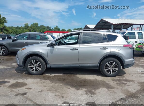 2T3WFREV9JW485852 2018 TOYOTA RAV4 Silver 360 interior view