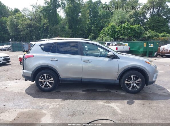 2T3WFREV9JW485852 2018 TOYOTA RAV4 Silver Rear interior view