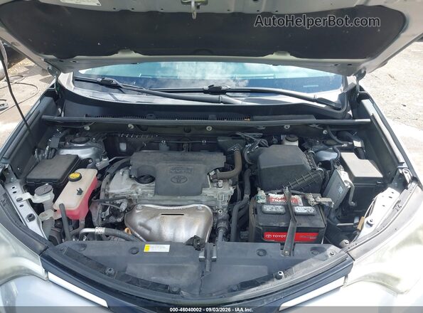 2T3WFREV9JW485852 2018 TOYOTA RAV4 Silver Rear view