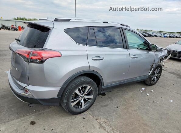 2T3WFREVXGW260848 2016 TOYOTA RAV4 Серебряный Задняя правая четверть