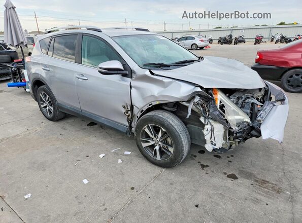 2T3WFREVXGW260848 2016 TOYOTA RAV4 Серебряный Передняя правая четверть