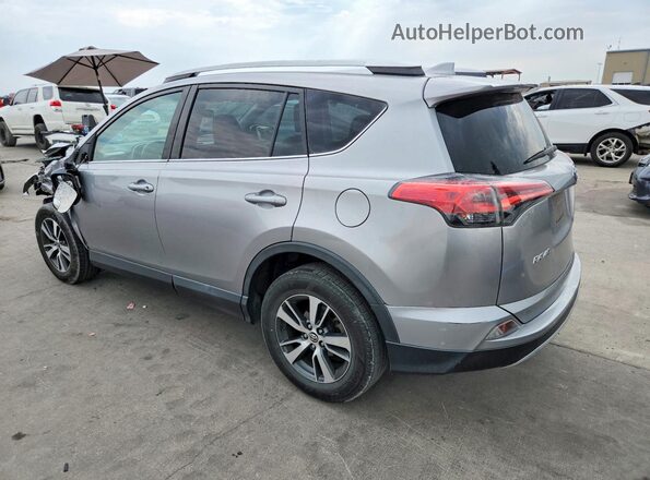 2T3WFREVXGW260848 2016 TOYOTA RAV4 Серебряный Задняя левая четверть