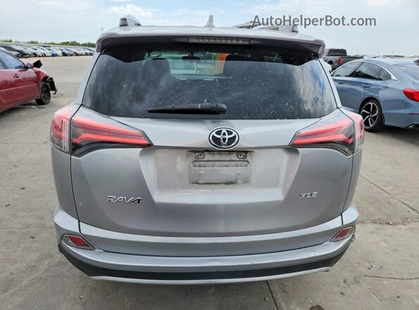2T3WFREVXGW260848 2016 TOYOTA RAV4 Серебряный Вид сзади