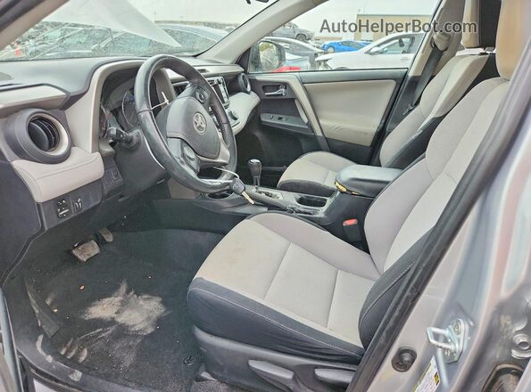 2T3WFREVXGW260848 2016 TOYOTA RAV4 Серебряный Вид салона спереди
