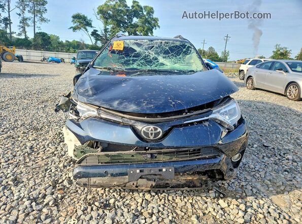2T3YFREV1HW324012 2017 TOYOTA RAV4 Teal Widok z przodu