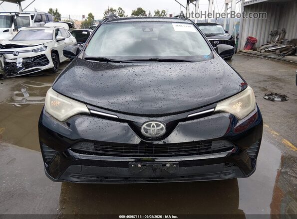2T3ZFREV1HW357015 2017 TOYOTA RAV4 Черный Вид задней части салона