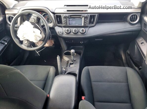 2T3ZFREV2JW470865 2018 TOYOTA RAV4 Черный Вид панели приборов