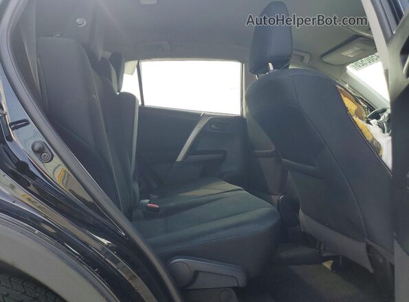 2T3ZFREV2JW470865 2018 TOYOTA RAV4 Черный Вид задней части салона