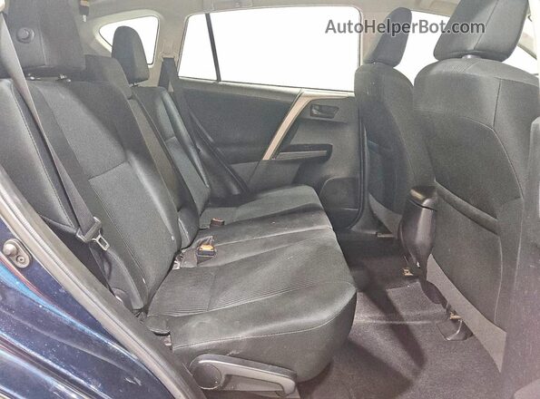 2T3ZFREV5JW469919 2018 TOYOTA RAV4 Teal Vista interior trasera