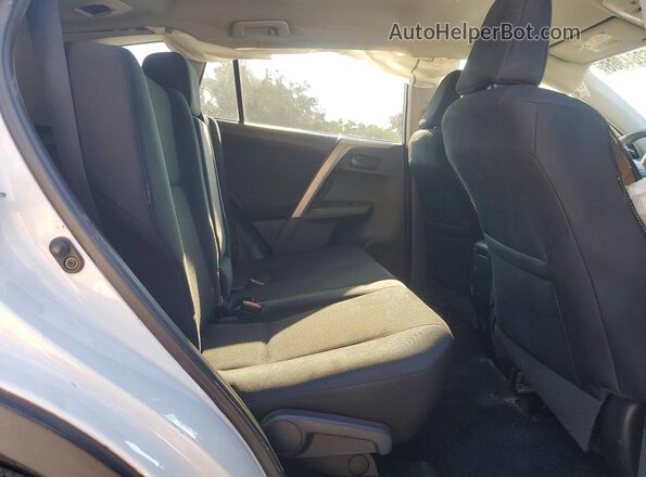 2T3ZFREV8GW291240 2016 TOYOTA RAV4 White Widok wnętrza z tyłu