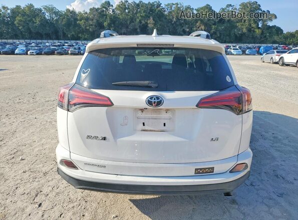 2T3ZFREV8GW291240 2016 TOYOTA RAV4 White Widok z tyłu