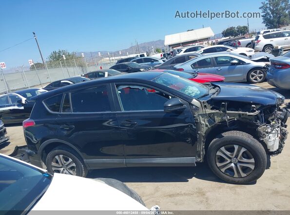 2T3ZFREV8JW435067 2018 TOYOTA RAV4 Черный Вид задней части салона