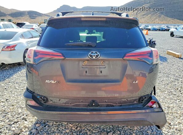 2T3ZFREV9JW492281 2018 TOYOTA RAV4 Gray Вид ззаду