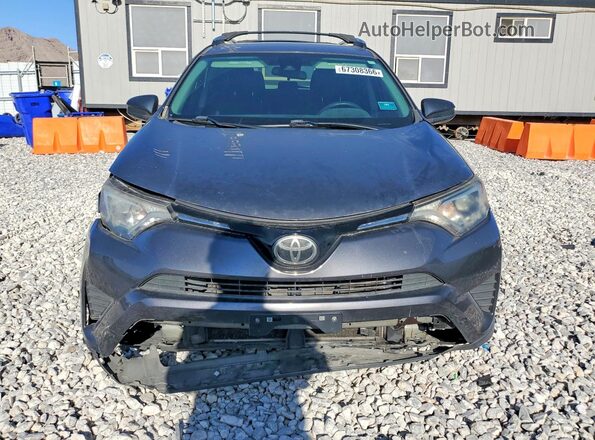 2T3ZFREV9JW492281 2018 TOYOTA RAV4 Gray Вид спереду