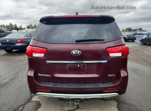 KNDME5C14G6117284 2016 KIA SEDONA Red Вид салону спереду