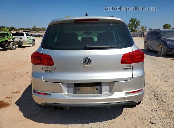 WVGUV7AX4HK018357 2017 VOLKSWAGEN TIGUAN Silver Front interior view