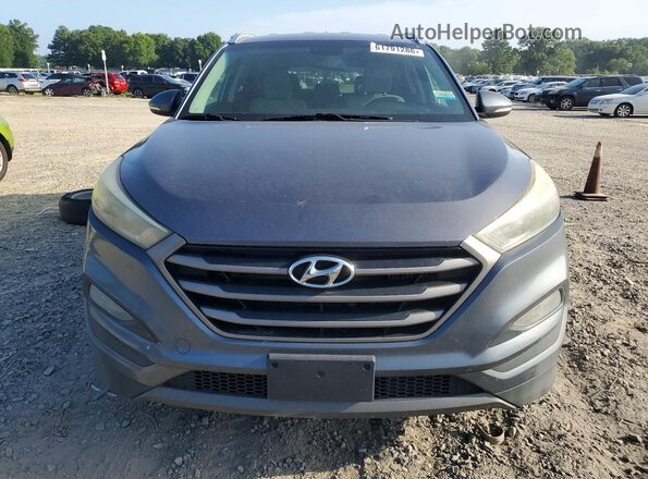 KM8J33A23GU101822 2016 HYUNDAI TUCSON Gray Widok z tyłu