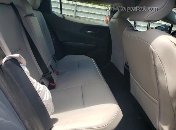 JTDACAAU5S3057069 2025 TOYOTA PRIUS Gray Rear interior view