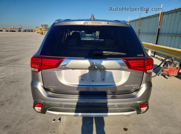 JA4JZ4AX1JZ010296 2018 MITSUBISHI OUTLANDER Gray Front interior view