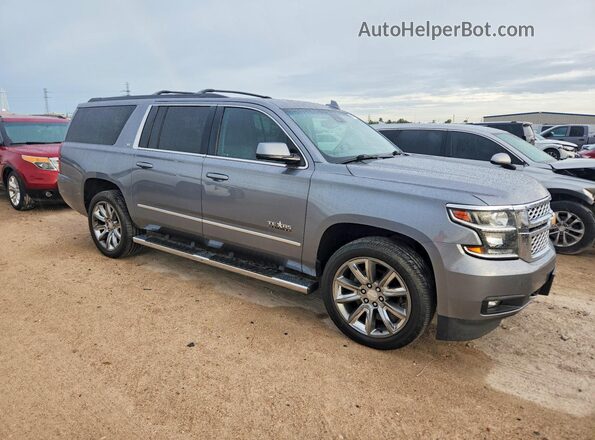 1GNSCHKC1KR262282 2019 CHEVROLET SUBURBAN Серебряный Вид спереди