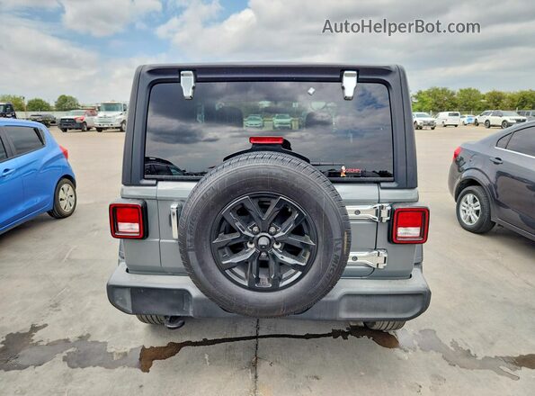 1C4GJXAN0PW639498 2023 JEEP WRANGLER Серый Вид салона спереди
