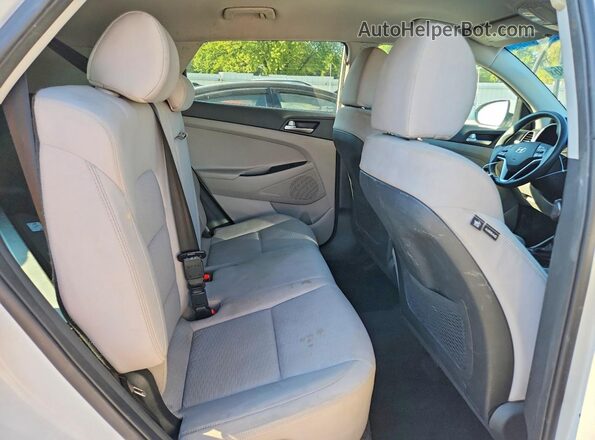 KM8J3CA47KU863982 2019 HYUNDAI TUCSON White Rear interior view