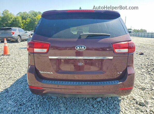KNDMB5C19G6163850 2016 KIA SEDONA Maroon Front interior view