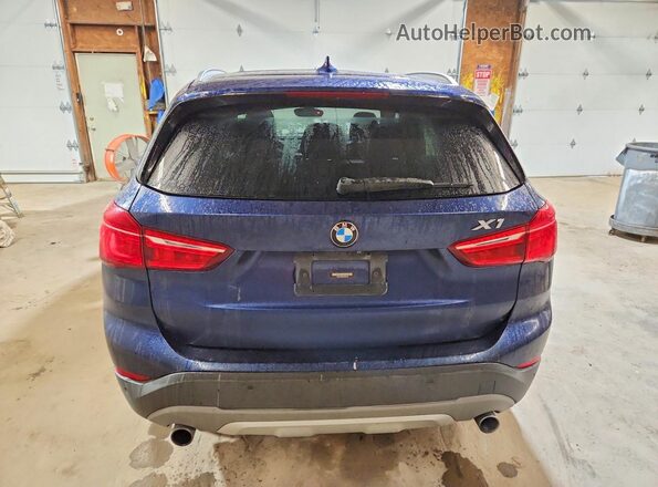 WBXHT3C32GP883105 2016 BMW X1 Blue Вид салону спереду