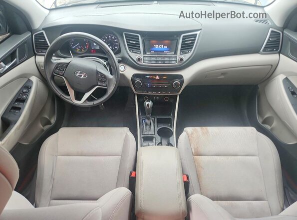 KM8J3CA22HU265032 2017 HYUNDAI TUCSON Gray ხელსაწყოთა პანელის ხედი