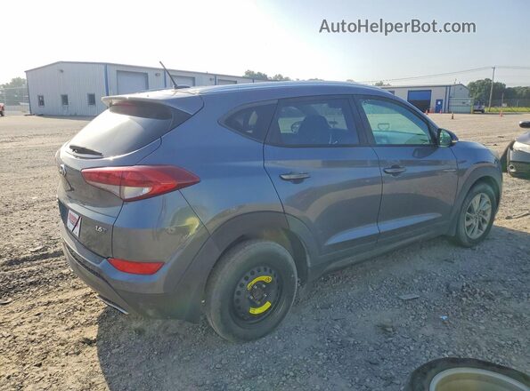 KM8J33A23GU101822 2016 HYUNDAI TUCSON Gray Przód prawy