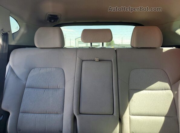 KM8J3CA45GU035632 2016 HYUNDAI TUCSON Black Rear interior view