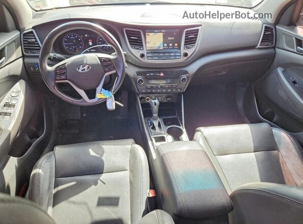 KM8J33A2XGU200296 2016 HYUNDAI TUCSON Black ხელსაწყოთა პანელის ხედი
