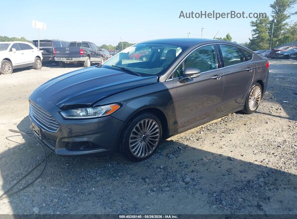 3FA6P0K91GR319330 2016 FORD FUSION Gray Vista tres cuartos delantera izquierda