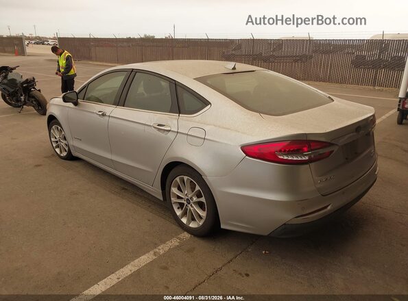 3FA6P0LU2KR141567 2019 FORD FUSION HYBRID Silver Trasero izquierdo
