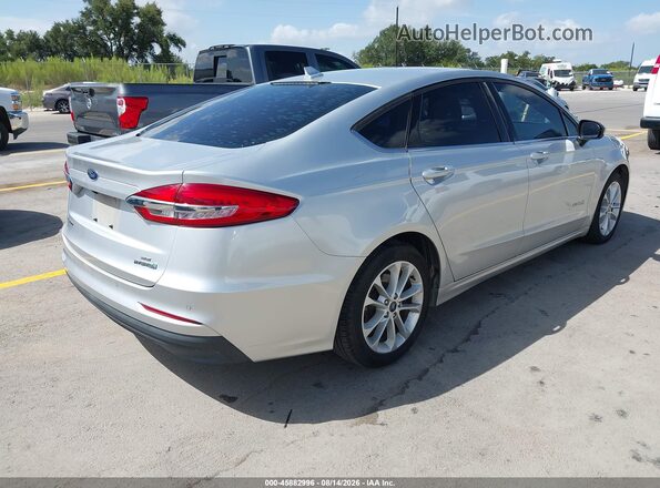 3FA6P0LU6KR258214 2019 FORD FUSION HYBRID Серебряный Задняя правая четверть