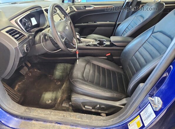 3FA6P0T90GR335940 2016 FORD FUSION Blue Vista interior delantera