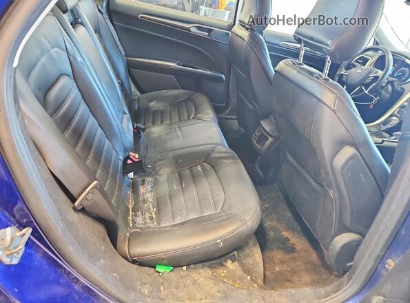 3FA6P0T90GR335940 2016 FORD FUSION Blue Vista de los asientos traseros