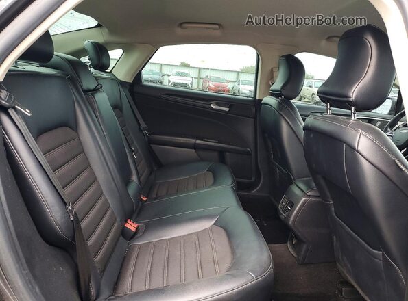 3FA6P0T96JR126029 2018 FORD FUSION Charcoal Vista de los asientos traseros
