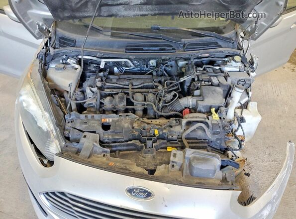 3FADP4AJ9JM108875 2018 FORD FIESTA Серебряный Вид задней части салона