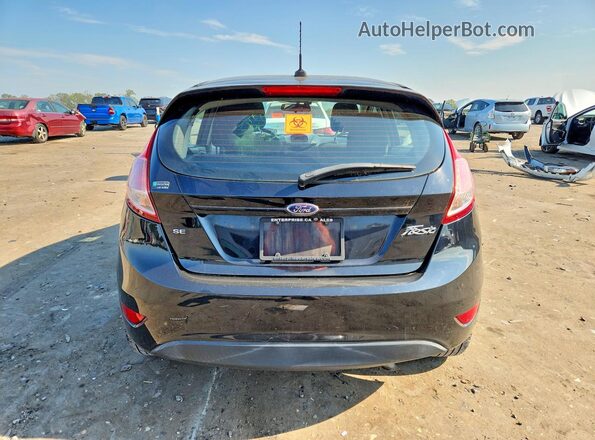 3FADP4EJ6JM133033 2018 FORD FIESTA Black Rear view