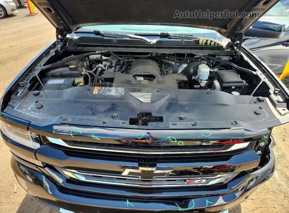 3GCUKSEC6JG206365 2018 CHEVROLET SILVERADO Black Вид задньої частини салону