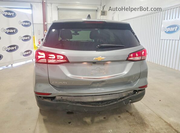 3GNAXKEG7PS210204 2023 CHEVROLET EQUINOX Серебряный Вид сзади