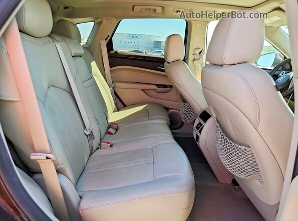 3GYFNBE33GS533614 2016 CADILLAC SRX Brown Rear interior view