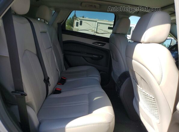 3GYFNEE35GS578510 2016 CADILLAC SRX Серебряный Вид задней части салона